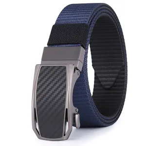 Detail of navy blue nylon belt with gunmetal automatic buckle and carbon fiber texture