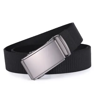 Detail of matte gray alloy automatic buckle and black heavy-duty woven nylon tactical belt