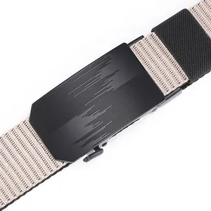 Detail of matte black metal buckle and khaki nylon webbed tactical belt texture