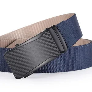 Detail of navy blue woven belt featuring a black buckle with carbon fiber texture