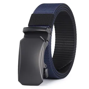 Detail of blue nylon woven belt with matte black buckle and cross texture