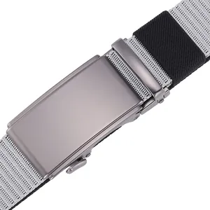 Close-up of gray metal automatic buckle and textured nylon webbing on casual men's belt