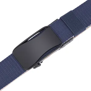 Detail of navy woven canvas belt with matte black automatic buckle and swivel head