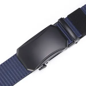 Detailed close-up of matte black metal buckle and navy nylon woven texture on belt