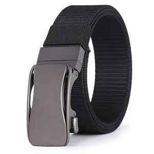 Detail of grey metal automatic buckle and black nylon tactical belt texture