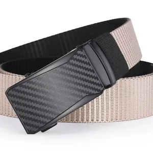 Detail of men's automatic buckle tactical belt featuring carbon fiber texture and nylon weave
