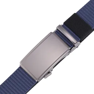 Detail of navy nylon tactical belt featuring matte grey automatic metal buckle