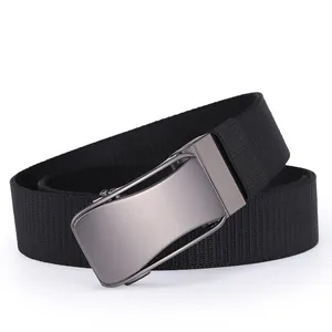 Close-up of matte grey zinc alloy automatic buckle and black nylon tactical belt texture