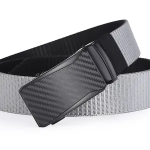 Detail of grey and black nylon tactical belt with carbon fiber texture automatic buckle