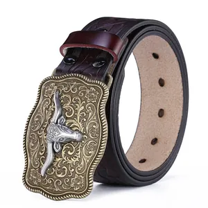 Vintage western cowboy belt with embossed longhorn bull head buckle and dark brown leather