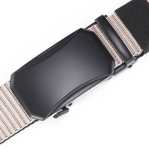 Detailed close-up of matte black buckle and textured beige-black braided nylon belt strap