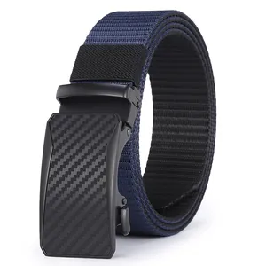 Detailed macro view of navy blue nylon woven belt with black carbon fiber automatic buckle