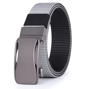 Detail of grey woven tactical belt showing the gunmetal automatic buckle and elastic segment