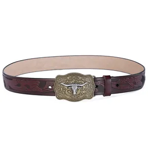 Western cowboy belt in dark brown leather with embossed floral patterns and bull head buckle