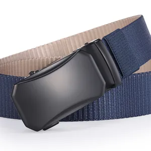 Close-up of matte black automatic buckle and navy woven nylon belt strap detail