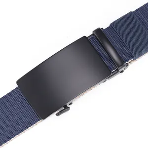 Close-up of matte black metal buckle and navy blue woven nylon tactical belt