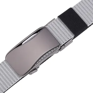 Detail of grey matte automatic metal buckle and nylon woven strap on men's tactical belt