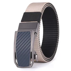 Detail of men's nylon belt with carbon fiber texture buckle and khaki woven strap