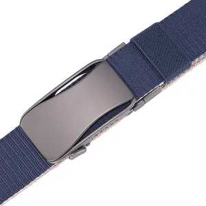 Detailed view of dark blue stretch woven belt with matte gunmetal finish buckle for men
