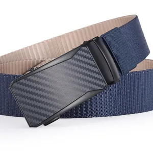 Detail of navy blue woven belt with carbon fiber texture automatic buckle for men