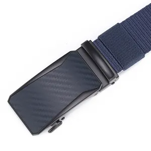 Close-up of carbon fiber texture on black automatic buckle with navy braided nylon belt