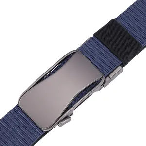 Close-up of the gun-gray metal automatic buckle and navy blue nylon tactical belt