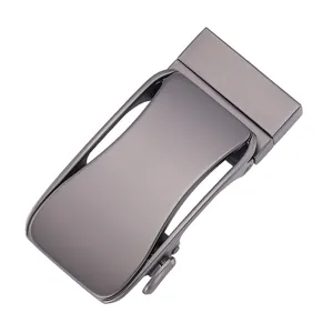 Close-up of rotatable dark gray metal alloy buckle with sleek matte finish and auto-slide