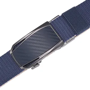 Detailed close-up of blue nylon belt with carbon fiber texture automatic metal buckle