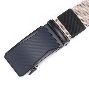 Detail of military style tactical belt with carbon fiber texture buckle and khaki nylon strap