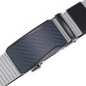 Detail of automatic buckle with carbon fiber texture and durable woven nylon belt strap