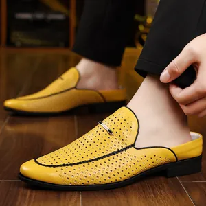 Men's yellow leather loafers with breathable cutout design and silver buckle detail