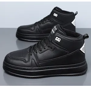 Detail view of black high-top sneakers with faux leather texture and fleece lining