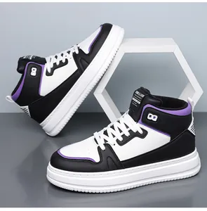 Detail view of high-top sneaker with purple accents and thick white rubber sole