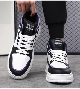 Macro shot of high-top sneaker detail showing purple accents and leather texture