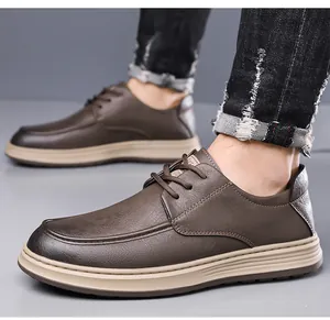 Detailed macro view of brown pebbled leather texture and non-slip rubber sole on men shoe