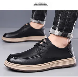 Close-up of black litchi grain leather men's casual shoes with thick khaki soles