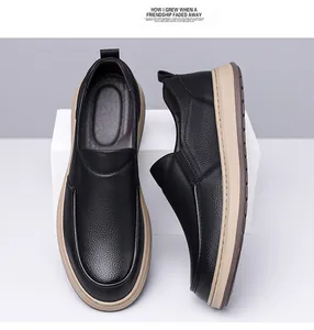 Detail of men's slip-on leather shoes featuring black lychee texture and durable soft sole