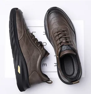Detail of men's brown leather casual shoe with wavy stitching and thick rubber sole