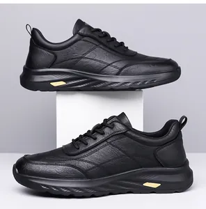 Detail of black leather casual shoes featuring gold accents and thick anti-slip soles