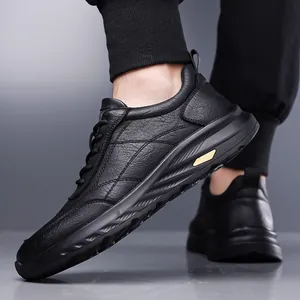 Men's black lychee pattern leather casual shoes with thick soles and gold accents