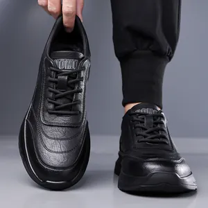 Men's stylish black leather lace-up casual sneakers with chunky soles and litchi texture