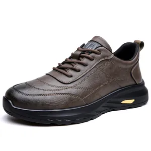 Men's casual dark brown leather sneaker with thick black sole and gold detail