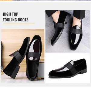 Detail of black velvet and patent leather loafers with decorative strap for men