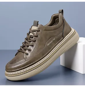 Detailed low-angle view of olive brown leather sneaker with thick anti-slip rubber sole