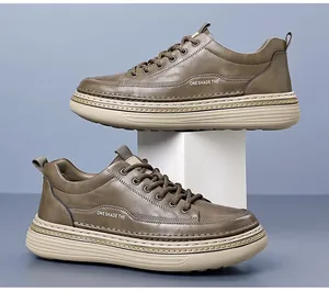 Detailed close-up of brown casual leather sneakers with thick beige soles and stitching