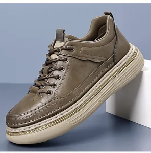 Detailed side view of brown leather casual shoes featuring reinforced stitching and thick soles