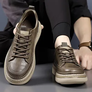 Brown textured leather casual shoes for men featuring thick soles and classic laces