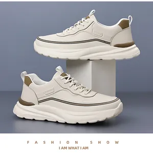 Detail view of cream and brown chunky outdoor sneakers with cushioned soft soles for men