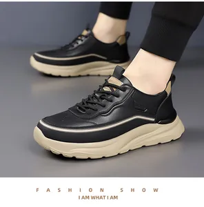 Detail view of black leather upper and khaki chunky sole on men's sport chunky sneakers