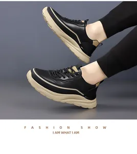 Dynamic on-foot view of black and beige chunky sole sneakers for men in fashion show